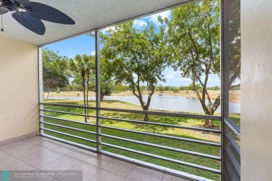 Enjoy a Serene Lake View from this Super Clean, Bright 2nd Floor on Palm-Aire Country Club and Resort - Palms in Florida - for sale on GolfHomes.com, golf home, golf lot