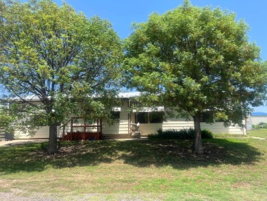 Located near Greenbelt Lake, a golf course, and a highly on Clarendon Country Club in Texas - for sale on GolfHomes.com, golf home, golf lot
