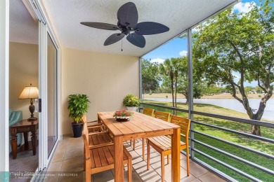 Enjoy a Serene Lake View from this Super Clean, Bright 2nd Floor on Palm-Aire Country Club and Resort - Palms in Florida - for sale on GolfHomes.com, golf home, golf lot