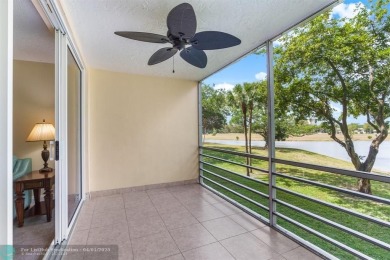 Enjoy a Serene Lake View from this Super Clean, Bright 2nd Floor on Palm-Aire Country Club and Resort - Palms in Florida - for sale on GolfHomes.com, golf home, golf lot