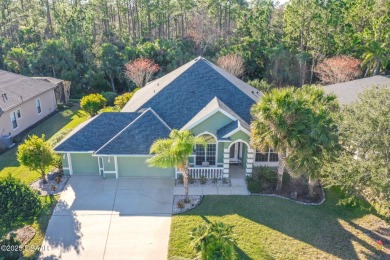 Welcome to this beautifully maintained 4-bedroom, 2-bathroom on Plantation Bay Golf and Country Club in Florida - for sale on GolfHomes.com, golf home, golf lot