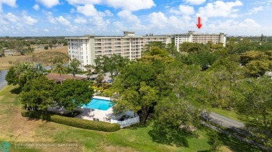 Enjoy a Serene Lake View from this Super Clean, Bright 2nd Floor on Palm-Aire Country Club and Resort - Palms in Florida - for sale on GolfHomes.com, golf home, golf lot