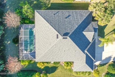 Welcome to this beautifully maintained 4-bedroom, 2-bathroom on Plantation Bay Golf and Country Club in Florida - for sale on GolfHomes.com, golf home, golf lot