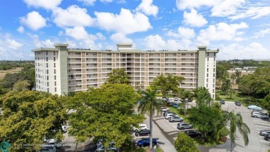 Enjoy a Serene Lake View from this Super Clean, Bright 2nd Floor on Palm-Aire Country Club and Resort - Palms in Florida - for sale on GolfHomes.com, golf home, golf lot