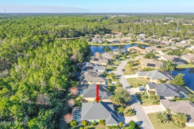 Welcome to this beautifully maintained 4-bedroom, 2-bathroom on Plantation Bay Golf and Country Club in Florida - for sale on GolfHomes.com, golf home, golf lot