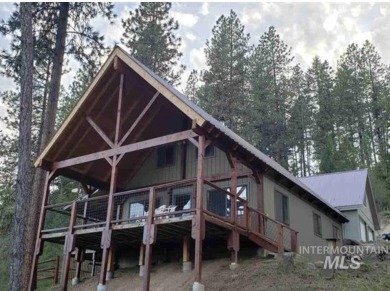 Year around access, no HOA or CC&R'S,  This beautiful cabin over on Terrace Lakes Golf Resort in Idaho - for sale on GolfHomes.com, golf home, golf lot