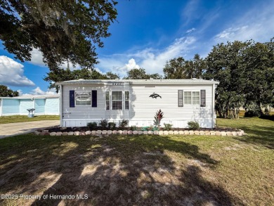 NO LOT RENT, it is a deeded lot, 2 bedrooms 1 Bath. A/C 2018 and on Glen Lakes Country Club in Florida - for sale on GolfHomes.com, golf home, golf lot
