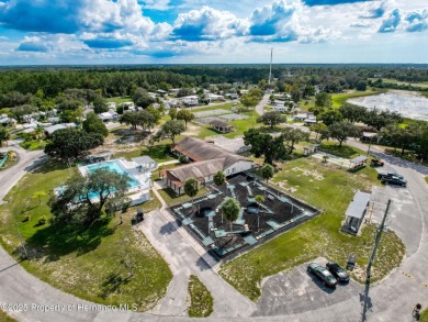 NO LOT RENT, it is a deeded lot, 2 bedrooms 1 Bath. A/C 2018 and on Glen Lakes Country Club in Florida - for sale on GolfHomes.com, golf home, golf lot