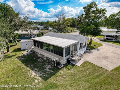 NO LOT RENT, it is a deeded lot, 2 bedrooms 1 Bath. A/C 2018 and on Glen Lakes Country Club in Florida - for sale on GolfHomes.com, golf home, golf lot