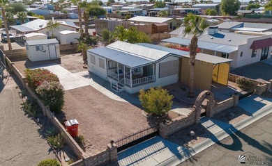 Welcome to this charming and well-maintained home located in on Las Barrancas Golf Course in Arizona - for sale on GolfHomes.com, golf home, golf lot
