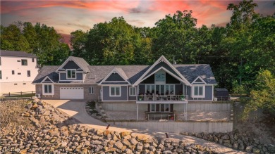 This exceptional, one-of-a-kind lake front property is simply on Lakeside Golf Course in Ohio - for sale on GolfHomes.com, golf home, golf lot
