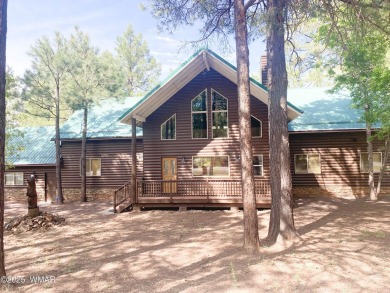 Experience comfort and privacy in this 5-bedroom, 6-bathroom on Pinetop Lakes Country Club in Arizona - for sale on GolfHomes.com, golf home, golf lot