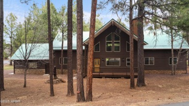 Experience comfort and privacy in this 5-bedroom, 6-bathroom on Pinetop Lakes Country Club in Arizona - for sale on GolfHomes.com, golf home, golf lot