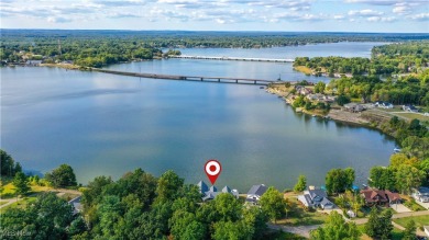This exceptional, one-of-a-kind lake front property is simply on Lakeside Golf Course in Ohio - for sale on GolfHomes.com, golf home, golf lot