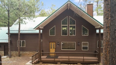 Experience comfort and privacy in this 5-bedroom, 6-bathroom on Pinetop Lakes Country Club in Arizona - for sale on GolfHomes.com, golf home, golf lot