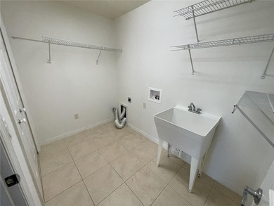 Located in the Village of Hadley, this Jasmine model features a on Glenview Championship Golf and Country Club in Florida - for sale on GolfHomes.com, golf home, golf lot