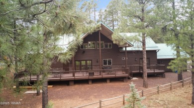 Experience comfort and privacy in this 5-bedroom, 6-bathroom on Pinetop Lakes Country Club in Arizona - for sale on GolfHomes.com, golf home, golf lot
