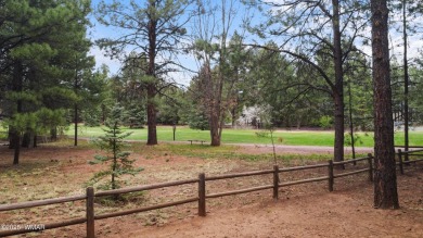 Experience comfort and privacy in this 5-bedroom, 6-bathroom on Pinetop Lakes Country Club in Arizona - for sale on GolfHomes.com, golf home, golf lot