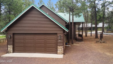 Experience comfort and privacy in this 5-bedroom, 6-bathroom on Pinetop Lakes Country Club in Arizona - for sale on GolfHomes.com, golf home, golf lot