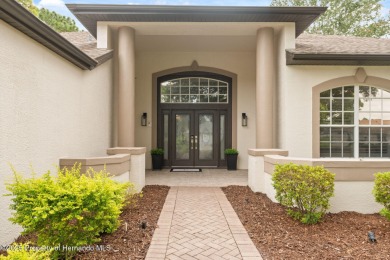 Tucked within the exclusive gated community of Silverthorn, this on Silverthorn Country Club in Florida - for sale on GolfHomes.com, golf home, golf lot