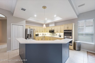 Tucked within the exclusive gated community of Silverthorn, this on Silverthorn Country Club in Florida - for sale on GolfHomes.com, golf home, golf lot