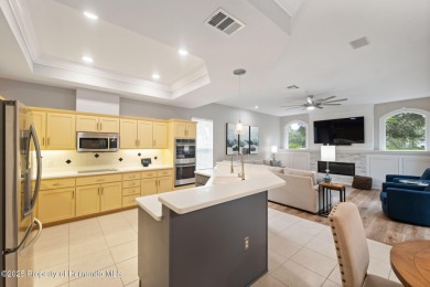 Tucked within the exclusive gated community of Silverthorn, this on Silverthorn Country Club in Florida - for sale on GolfHomes.com, golf home, golf lot