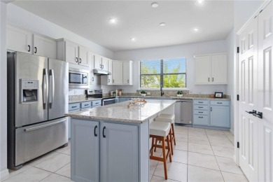 Experience the pinnacle of lakefront living in the heart of on Sarasota National Golf Club in Florida - for sale on GolfHomes.com, golf home, golf lot