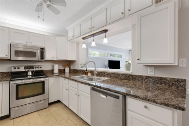 Welcome to the heart of Lakeland! Just steps from Lake on Cleveland Heights Golf Course in Florida - for sale on GolfHomes.com, golf home, golf lot
