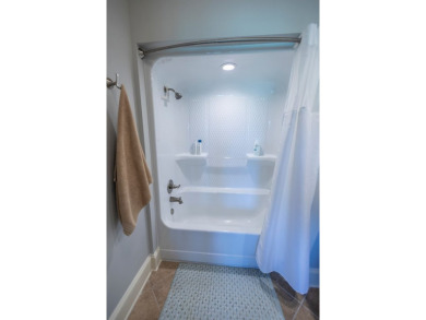 Enjoy carefree luxury living in this stunning 4BR/3.5BA on Kinderlou Forest Golf Club in Georgia - for sale on GolfHomes.com, golf home, golf lot