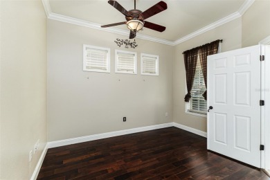 Welcome to this beautiful 3-bedroom, 2-bath lakefront home on Grasslands Golf and Country Club in Florida - for sale on GolfHomes.com, golf home, golf lot