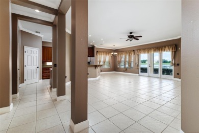 Welcome to this beautiful 3-bedroom, 2-bath lakefront home on Grasslands Golf and Country Club in Florida - for sale on GolfHomes.com, golf home, golf lot