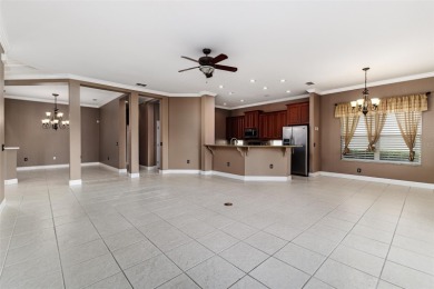 Welcome to this beautiful 3-bedroom, 2-bath lakefront home on Grasslands Golf and Country Club in Florida - for sale on GolfHomes.com, golf home, golf lot