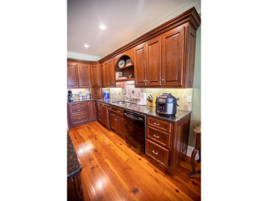 Enjoy carefree luxury living in this stunning 4BR/3.5BA on Kinderlou Forest Golf Club in Georgia - for sale on GolfHomes.com, golf home, golf lot