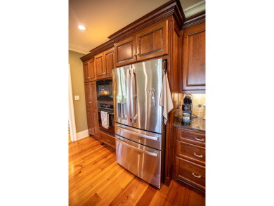 Enjoy carefree luxury living in this stunning 4BR/3.5BA on Kinderlou Forest Golf Club in Georgia - for sale on GolfHomes.com, golf home, golf lot