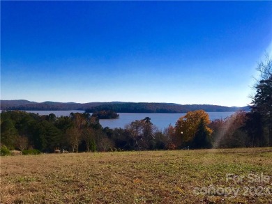Beautiful lot overlooking the Uwharrie National Forest and Badin on Uwharrie Point Golf Community in North Carolina - for sale on GolfHomes.com, golf home, golf lot