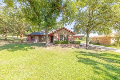 Welcome to this charming home in the peaceful community of on Hilltop Lakes Resort Golf Club in Texas - for sale on GolfHomes.com, golf home, golf lot