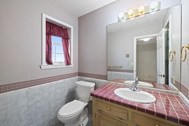 Spacious and full of character, this 3-bedroom, 3-bath home on Slick Rock Golf Course - Horseshoe Bay in Texas - for sale on GolfHomes.com, golf home, golf lot