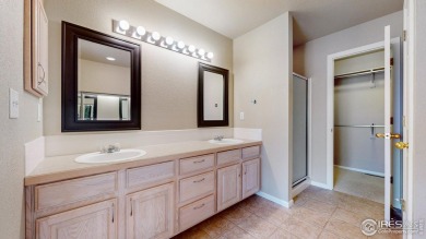 Rare end-unit townhome in the highly sought-after Water Valley on Pelican Lakes Golf and Country Club in Colorado - for sale on GolfHomes.com, golf home, golf lot