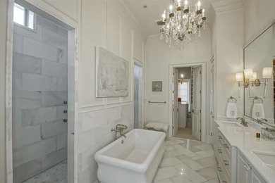 Experience refined living in the gated community of English Turn on English Turn Golf and Country Club in Louisiana - for sale on GolfHomes.com, golf home, golf lot