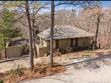 This lovely 4bdrm/2ba home offers SEASONAL LAKE VIEWS & is on The Coves Golf Course in Oklahoma - for sale on GolfHomes.com, golf home, golf lot