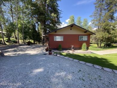 Nestled in a park-like setting just minutes from Pinehurst Golf on Pinehurst Golf Course in Idaho - for sale on GolfHomes.com, golf home, golf lot