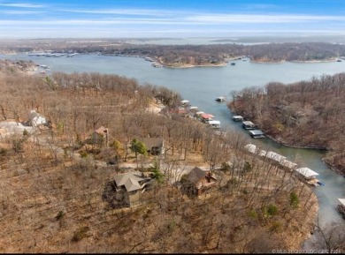 This lovely 4bdrm/2ba home offers SEASONAL LAKE VIEWS & is on The Coves Golf Course in Oklahoma - for sale on GolfHomes.com, golf home, golf lot