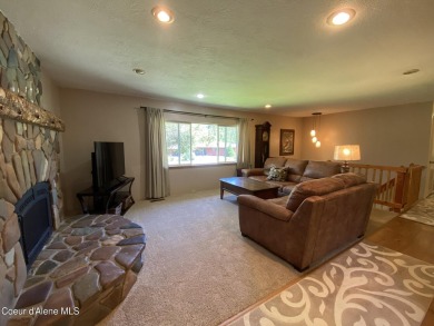 Nestled in a park-like setting just minutes from Pinehurst Golf on Pinehurst Golf Course in Idaho - for sale on GolfHomes.com, golf home, golf lot