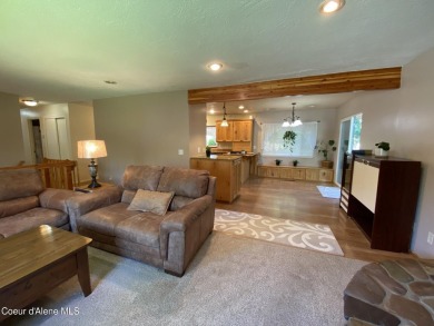 Nestled in a park-like setting just minutes from Pinehurst Golf on Pinehurst Golf Course in Idaho - for sale on GolfHomes.com, golf home, golf lot