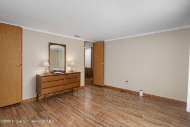 Step into this beautifully maintained 4-bedroom, 2-bathroom home on High Point Golf Club, Inc. in Florida - for sale on GolfHomes.com, golf home, golf lot