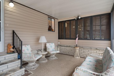 Step into this beautifully maintained 4-bedroom, 2-bathroom home on High Point Golf Club, Inc. in Florida - for sale on GolfHomes.com, golf home, golf lot