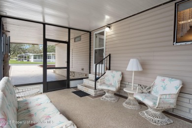Step into this beautifully maintained 4-bedroom, 2-bathroom home on High Point Golf Club, Inc. in Florida - for sale on GolfHomes.com, golf home, golf lot