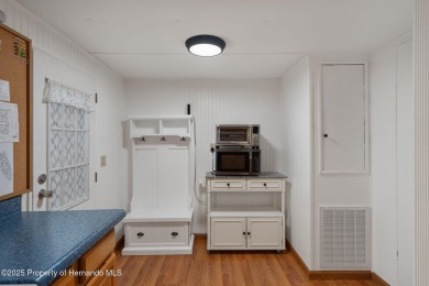 Step into this beautifully maintained 4-bedroom, 2-bathroom home on High Point Golf Club, Inc. in Florida - for sale on GolfHomes.com, golf home, golf lot