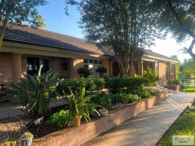 This stunning custom-built home is situated on an oversized on Rancho Viejo Resort and Country Club in Texas - for sale on GolfHomes.com, golf home, golf lot