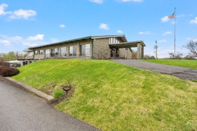 Own a piece of history with this unique mid-century modern on Winding Brook Country Club in New York - for sale on GolfHomes.com, golf home, golf lot